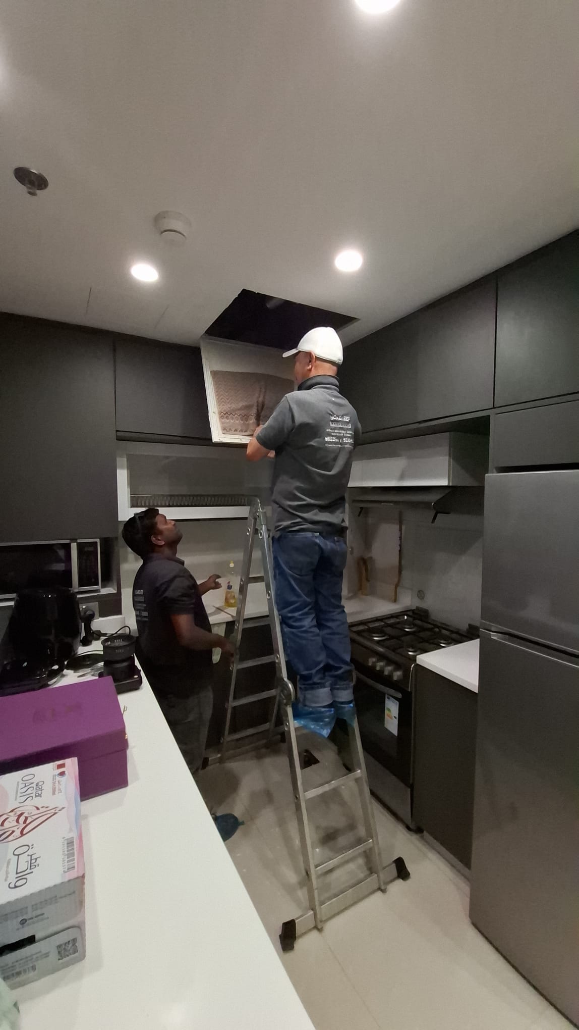 FCU servicing in villa kitchen — Homekeep Qatar